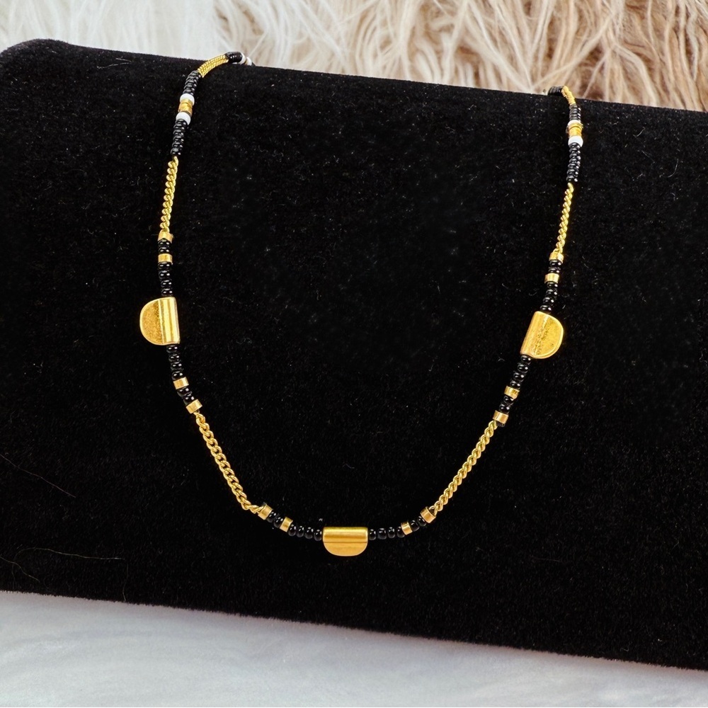 Delicate goldtone, black beaded minimalist necklace